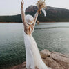 Rustic Bohemian Tulle Wedding Dress with Full Sleeves and Backless Design