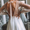 Rustic Bohemian Tulle Wedding Dress with Full Sleeves and Backless Design