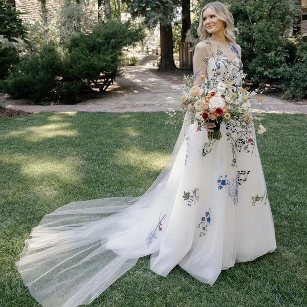 Elegant Floral Lace A-Line Wedding Dress with Illusion Back and Sweep Train