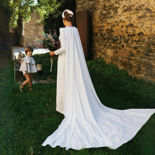 Modern Satin Sheath Wedding Dress with Full Sleeves and Detachable Cape