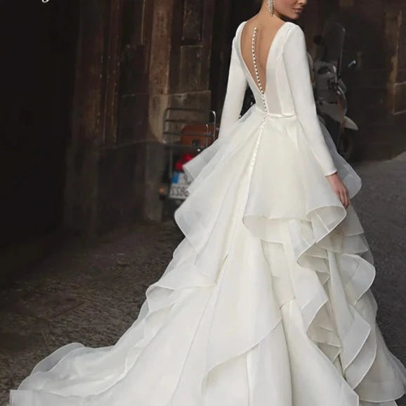 Satin Ball Gown Wedding Dress with Deep V-Neck and Ruffles – Elegant Backless Bridal Gown