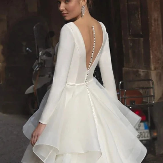 Satin Ball Gown Wedding Dress with Deep V-Neck and Ruffles – Elegant Backless Bridal Gown