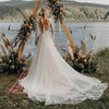 Boho Lace V-Neck Wedding Dress with Full Sleeves and Sweep Train - Elegant Backless Design for Beach and Outdoor Weddings