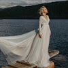 Boho Lace V-Neck Wedding Dress with Full Sleeves and Sweep Train - Elegant Backless Design for Beach and Outdoor Weddings