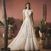 Bohemian Vintage Chiffon Wedding Dress with Cap Sleeves and Backless Design