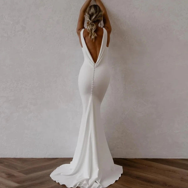 Elegant Minimalist Backless Mermaid Wedding Dress with V-Neck and Sweep Train