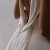 Elegant Minimalist Backless Mermaid Wedding Dress with V-Neck and Sweep Train