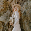 Boho Lace Mermaid Wedding Dress with Full Sleeves, O-Neck, and Backless Design