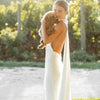 Elegant Sleeveless Mermaid Satin Wedding Dress with V-Neck and Sweep Train - Backless Design