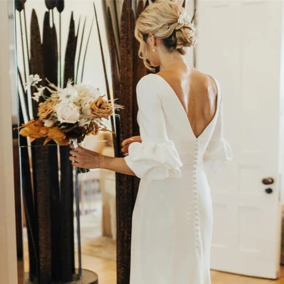 Chic Minimalist Satin Wedding Dress with V-Neck and Sweep Train - Elegant Backless Design