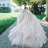 Elegant Lace & Beaded Tulle A-Line Wedding Dress with Spaghetti Straps & Chapel Train