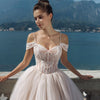 Elegant Lace & Beaded Tulle A-Line Wedding Dress with Spaghetti Straps & Chapel Train