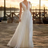 Vintage Bohemian Chiffon Wedding Dress with Lace Detailing and a V-Neck