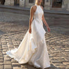 Elegant Halter Neck Satin Wedding Dress with Backless Design and Sweep Train