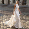 Elegant Halter Neck Satin Wedding Dress with Backless Design and Sweep Train