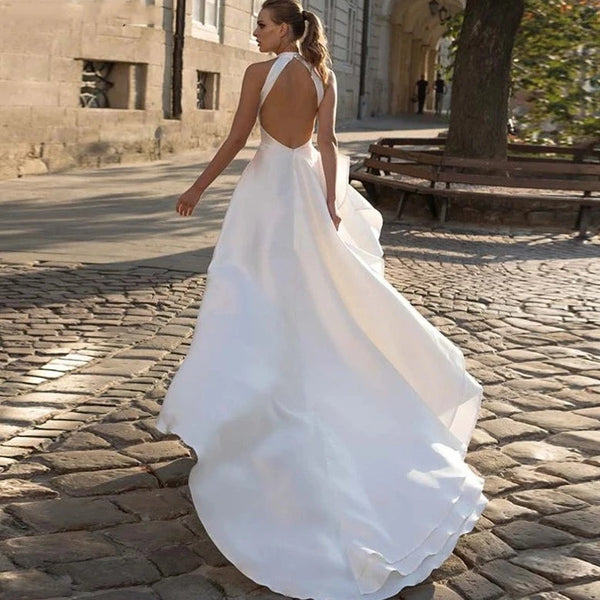 Elegant Halter Neck Satin Wedding Dress with Backless Design and Sweep Train