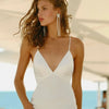 Chic Boho Backless Mermaid Wedding Dress with Spaghetti Straps and Deep V-Neck