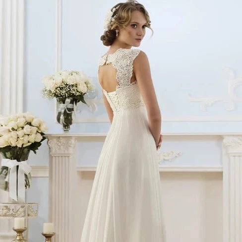 Classic Empire Waist Wedding Dress with Sweetheart Neckline, Cap Sleeves, and Chiffon Satin Finish