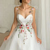 Elegant White Tulle Prom Dress with Sweet Floral Details and Spaghetti Straps