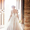 Stunning V-Neck Lace Wedding Dress with Long Illusion Sleeves and Beaded Belt - Elegant A-Line Bridal Gown