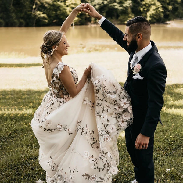 Romantic Cap Sleeves Embroidered Floral Wedding Dress with Plunge V-Neck and Sweep Train