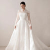 Exquisite V-Neck Lace Wedding Dress with Full Sleeves and Sweep Train – Elegant A-Line Bridal Gown for Arabian Weddings