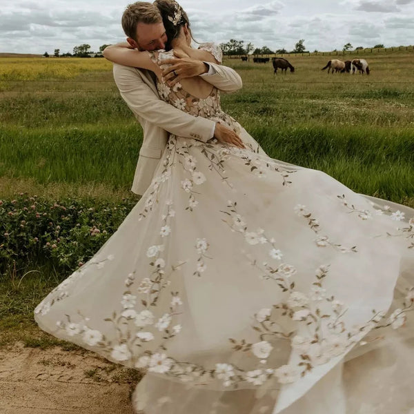 Romantic Cap Sleeves Embroidered Floral Wedding Dress with Plunge V-Neck and Sweep Train