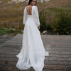 Elegant Flowy Bohemian Chiffon Wedding Dress with Puff Sleeves and V-Neck